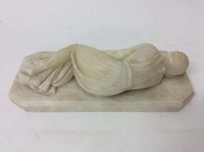 Lot 984 - Small 19th century carved alabaster reclining figure of St. Theresa of Avila