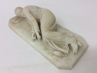 Lot 984 - Small 19th century carved alabaster reclining figure of St. Theresa of Avila
