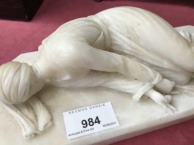 Lot 984 - Small 19th century carved alabaster reclining figure of St. Theresa of Avila