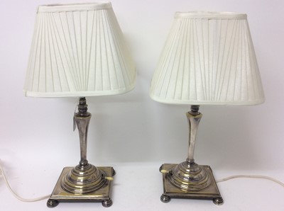 Lot 989 - Pair of early 20th century silvered brass table lamps