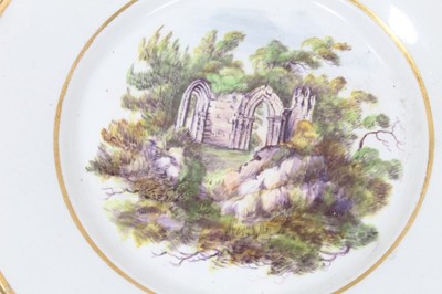 Lot 244 - Set of six pearlware plates and two dessert dishes c.1800, decorated with rural scenes and gilt borders 
  
Provenance: The Oprah Winfrey Collection