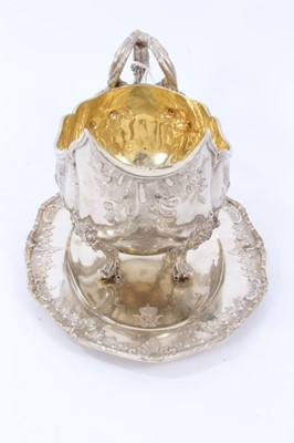Lot 37 - Late 19th Century German Silver Sauce Boat of oval form, from the Royal Prussian Collection, with reeded border, repousse and chased with rocaille, flowers and foliage, with bifurcated foliage-capp...