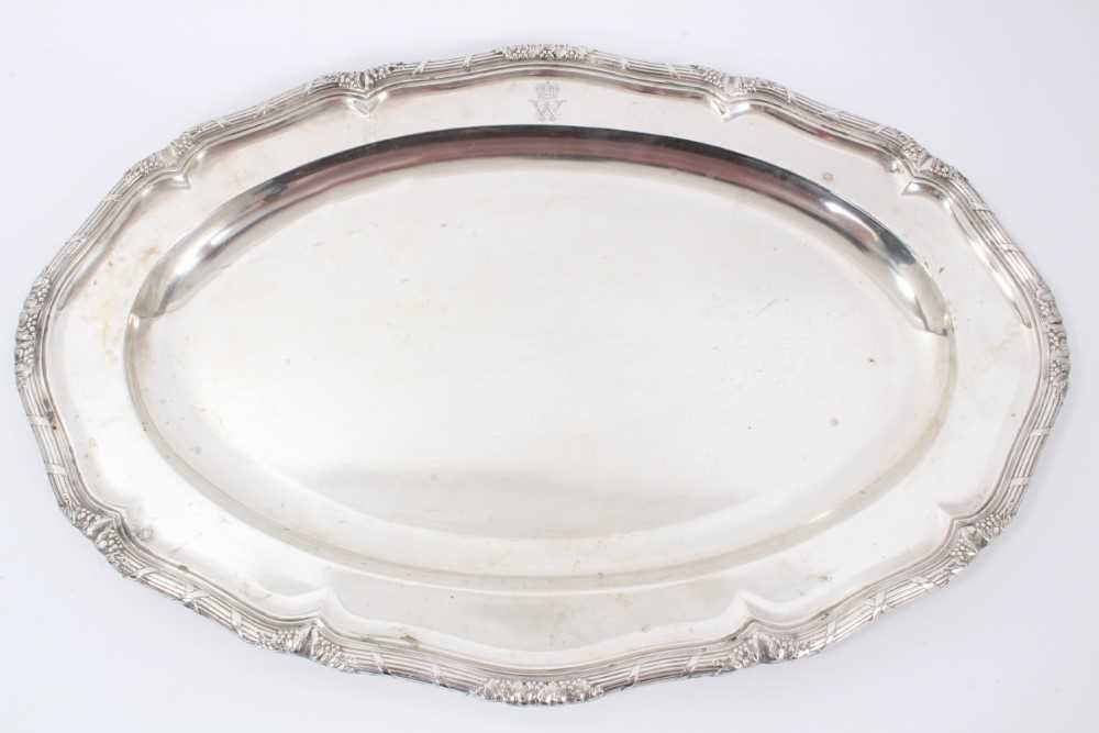 Lot 39 - Late 19th Century German Silver Meat Dish, from the Royal Prussian Collection, of oval form with ribbon-bound reeded border, cast and chased at intervals with fruiting vines. Engraved with WR monog...