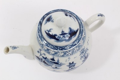 Lot 246 - Small Lowestoft blue and white teapot with Worcester cover, decorated in the chinoiserie style, 12cm high