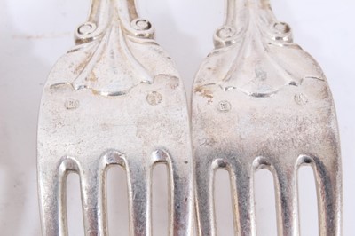 Lot 50 - Six mid 19th century German Silver Dinner Forks, Modified Kings pattern with fluted stems and foliate terminals, from the Royal Prussian Collection, each cast and chased with raised WR monogram wit...