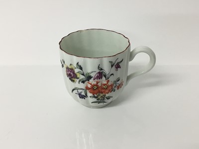 Lot 251 - Derby fluted coffee cup, circa 1756, polychrome painted with flowers, 6cm high