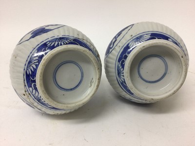 Lot 255 - Pair of 18th/19th century Chinese blue and white triple gourd vases, the main sections ribbed, painted with panels containing precious objects