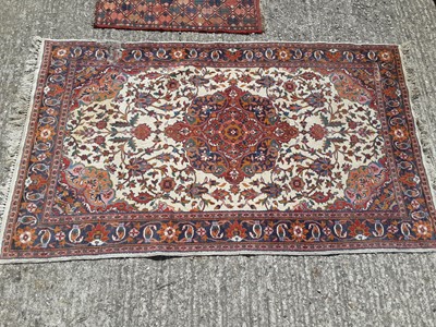 Lot 413 - Three Eastern rugs, largest is 154cm x 92cm