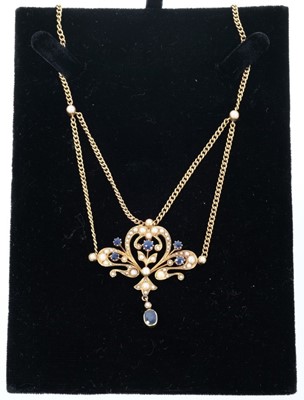 Lot 651 - Edwardian gold seed pearl and sapphire pendant