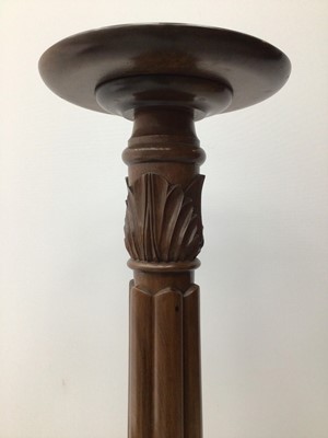 Lot 164 - Victorian mahogany torchere with reeded column on three splayed legs, 154cm high