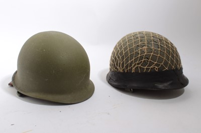 Lot 810 - Israeli MIC - style paratrooper helmet with three point harness and liner, circa 1970s, together with Israeli armoured vehicle crewman's helmet with liner (2)