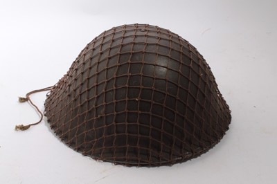 Lot 812 - Second World War British military MK III steel helmet complete with liner and chin strap, as worn at D- Day