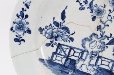 Lot 270 - Collection of Lowestoft pieces, including a tea bowl and saucer of fluted form, painted with scattered flower sprays and sprigs, a further tea bowl and saucer printed in blue with a Chinese river s...