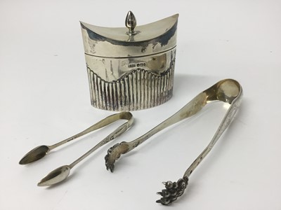 Lot 891 - Edwardian silver tea caddy of half fluted boat form, by James Dixon & Sons, Sheffield 1903, 9.5cm wide, together with a pair od French silver sugar tongs and another pair of sugar tongs