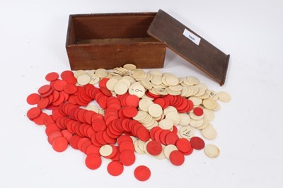 Lot 960 - Large quantity of red and white stained bone counters, in a wooden box with sliding cover.