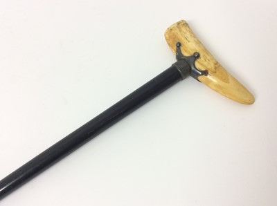 Lot 964 - 19th century walking cane with ebonised shaft, white metal mount and Marine ivory handle.