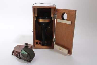 Lot 819 - First World War period British miltary Officers' private purchase compass in brown leather case, together with a vintage hand bearing compass (2)