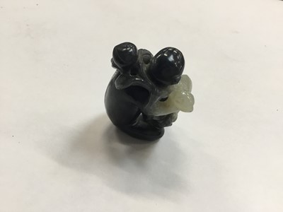 Lot 943 - Chinese jade or green hardstone carving, depicting a family of monkeys, utilising the colours in the stone, 3cm high, together with a pair of jade or green hardstone figures of reclining buffalo an...