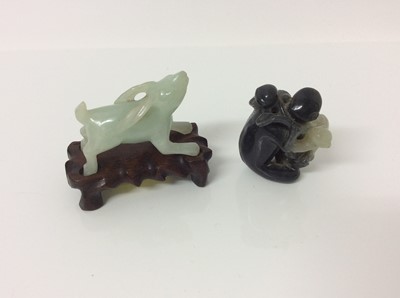 Lot 943 - Chinese jade or green hardstone carving, depicting a family of monkeys, utilising the colours in the stone, 3cm high, together with a pair of jade or green hardstone figures of reclining buffalo an...