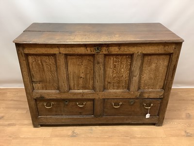Lot 1069 - Mid 18th century oak mule chest, hinged top with moulded edge, four panelled front above two drawers, on stiles, 122cm long x 53cm deep x 82cm high