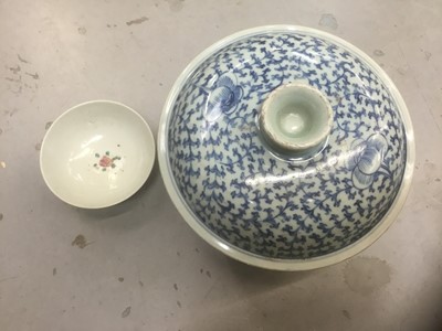 Lot 317 - A Qing dynasty style blue and white jar with lid and a small famille rose bowl