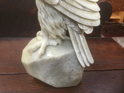 Lot 312 - A whole stone carved eagle