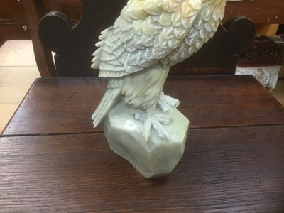 Lot 312 - A whole stone carved eagle