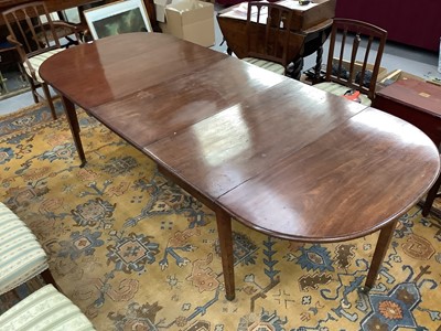 Lot 1440 - George III mahogany extending dining table, with D-shaped ends and central folding section, raised on square tapered legs and brass cappings and castors