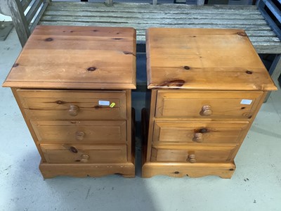 Lot 142 - Pine chest of two short and three long drawers, 90cm wide x 45cm deep x 94cm high and a pair of pine three drawer bedside chests