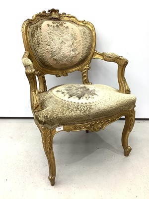Lot 145 - Gilt framed open elbow chair with floral upholstered seat and back on cabriole front legs