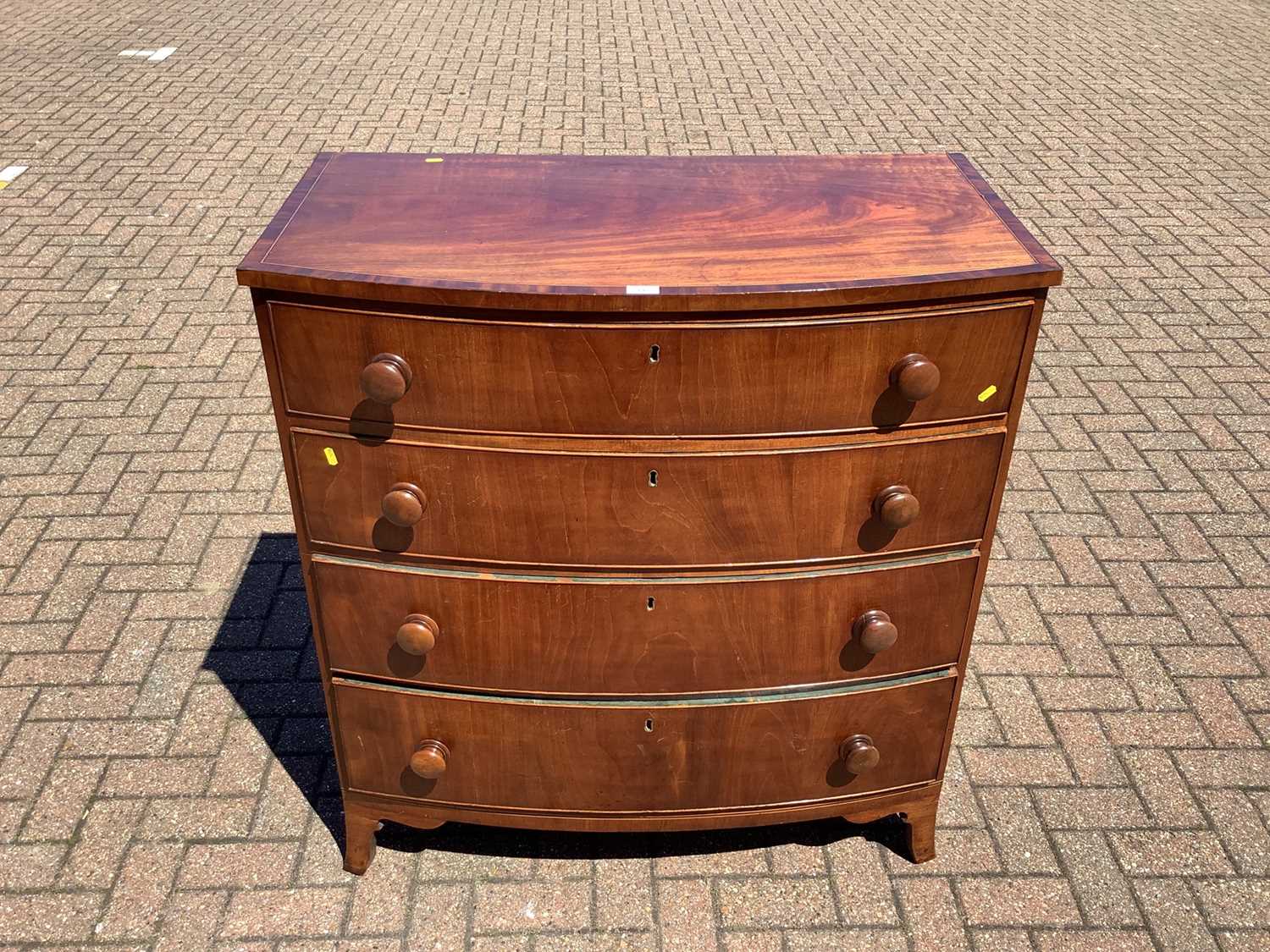 Lot 148 - 19th century inlaid mahogany bowfront chest of four long graduated drawers on splayed bracket feet, 100cm wide x 55cm deep x 108cm high