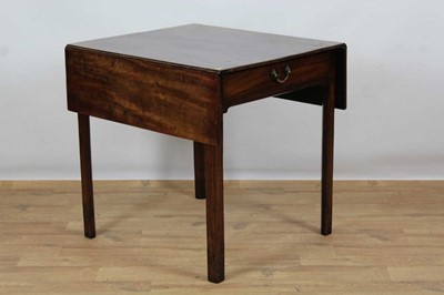 Lot 1473 - George III mahogany pembroke table, with rectangular hinged top and end frieze drawer on internally chamfered square tapered legs, top 75 x 67cm extending to 75 x 110cm