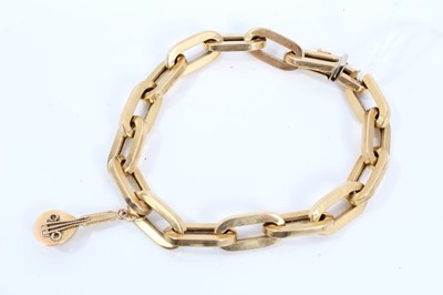 Lot 168 - 18ct gold oval link bracelet with mandolin charm