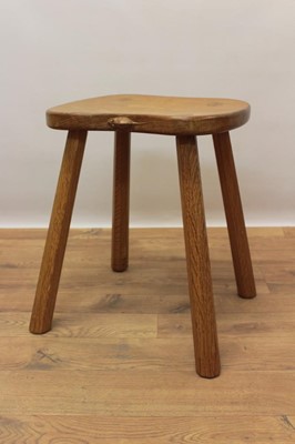 Lot 1298 - Robert Mouseman Thompson oak stool, with saddle seat, signature mouse to one side