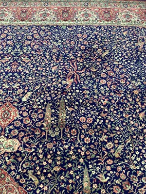 Lot 188 - Large Wilton rug on multi coloured ground, 457cm x 366cm