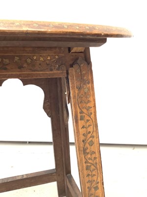 Lot 191 - Eastern folding occassional table with brass inlay