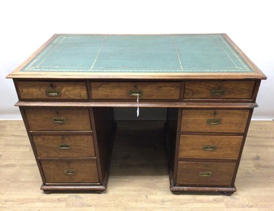 Lot 1512 - Early 20th century teak campaign style pedestal desk