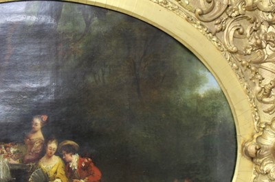 Lot 1236 - Manner of Nicolas Lancret (1690-1743), 18th century oval oil on canvas - elegant figures and a peacock in an ornamental garden, 45cm x 57cm, in ornate gilt frame