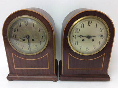 Lot 768 - Two late 19th / early 20th century mantel clocks with possibly experimental 8 day full Westminster chiming movements achieved  with only two winding holes in inlaid mahogany cases 34 cm high