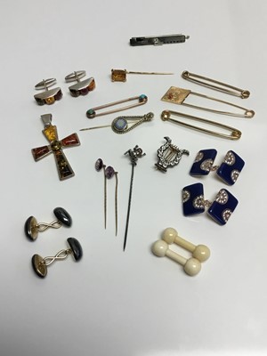 Lot 665 - Group of antique and later stick pins, tie pins and cufflinks to include an Art Deco white gold diamond and black onyx bar brooch/tie pin, gold and gem set stick pins, gold safety pin style tie pin...