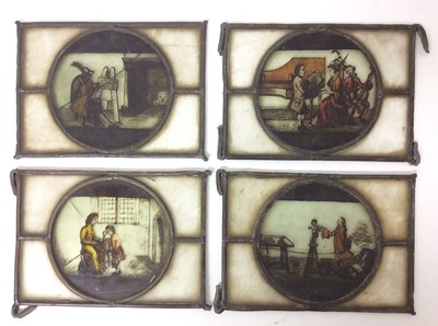 Lot 991 - Four 18th / 19th century stained glass panels, each with a circular reserve depicting figures representing an artist, a sculptor, a teacher and a musician. Each approximately 14.5cm x 19.5cm.