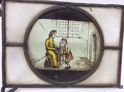 Lot 991 - Four 18th / 19th century stained glass panels, each with a circular reserve depicting figures representing an artist, a sculptor, a teacher and a musician. Each approximately 14.5cm x 19.5cm.