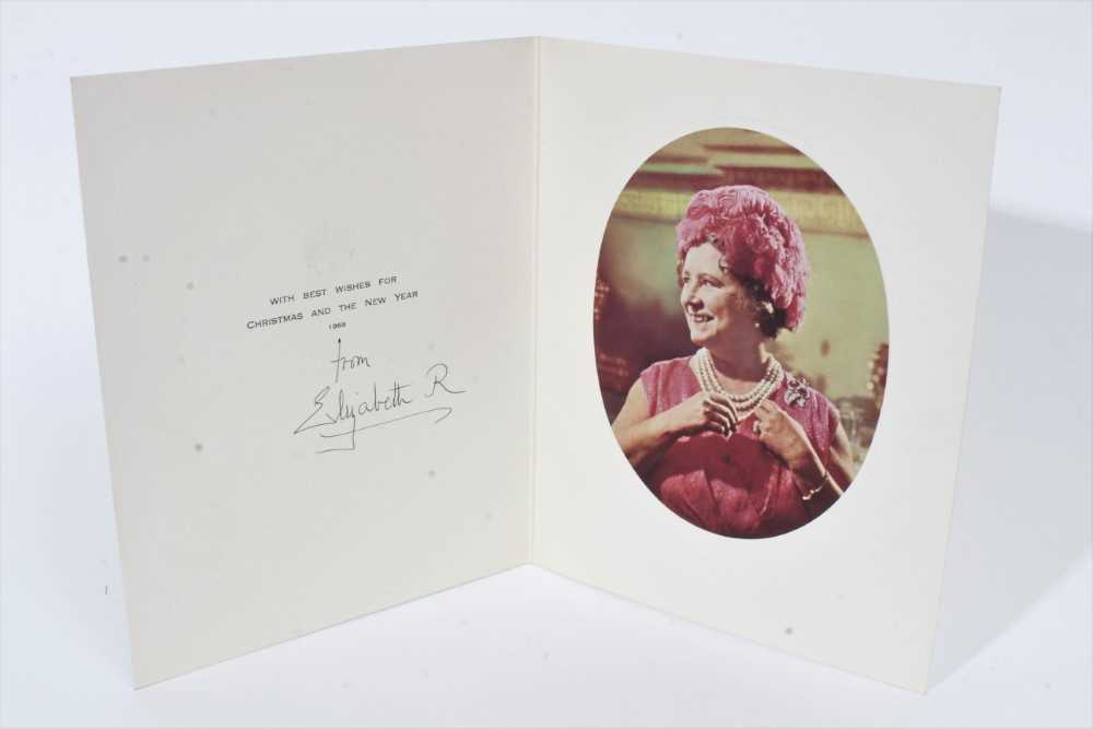 Lot 84 - H.M. Queen Elizabeth The Queen Mother, signed 1969 Christmas card with photograph of Her Majesty in pink floral hat - sent to William Tallon , with envelope.