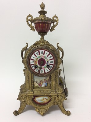 Lot 776 - Two late 19th century French gilt metal and porcelain mounted mantel clocks decorated with romantic scenes ,36 and 38 cm high, both with keys and pendulums  (2)