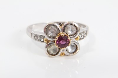 Lot 194 - 18ct white gold diamond and ruby flower head ring