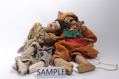 Lot 1643 - Four string puppets including three Balinese and one other.