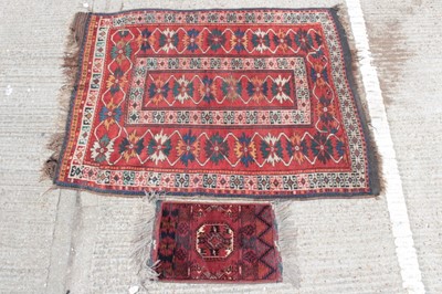 Lot 1561 - Eastern rug, with geometric flower head ornament on brick red ground, 172 x 138cm, together with a very small Bokhara rug. (2)