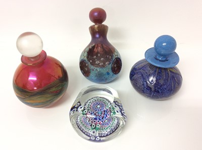 Lot 1023 - Okra iridescent glass paperweight/bottle with stopper and two other similar