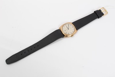 Lot 210 - 9ct gold vintage Garrard wristwatch on black leather strap