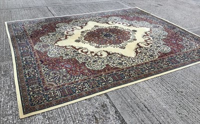 Lot 1562 - Wilton carpet, with concentric medallion ornament on cream ground, approximately 490 x 360cm